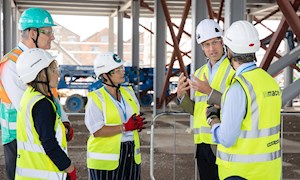 Prince William discusses suicide prevention at Mace construction site