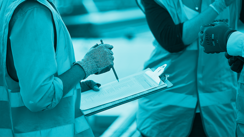 Workers with  a clipboard with a blue filter 