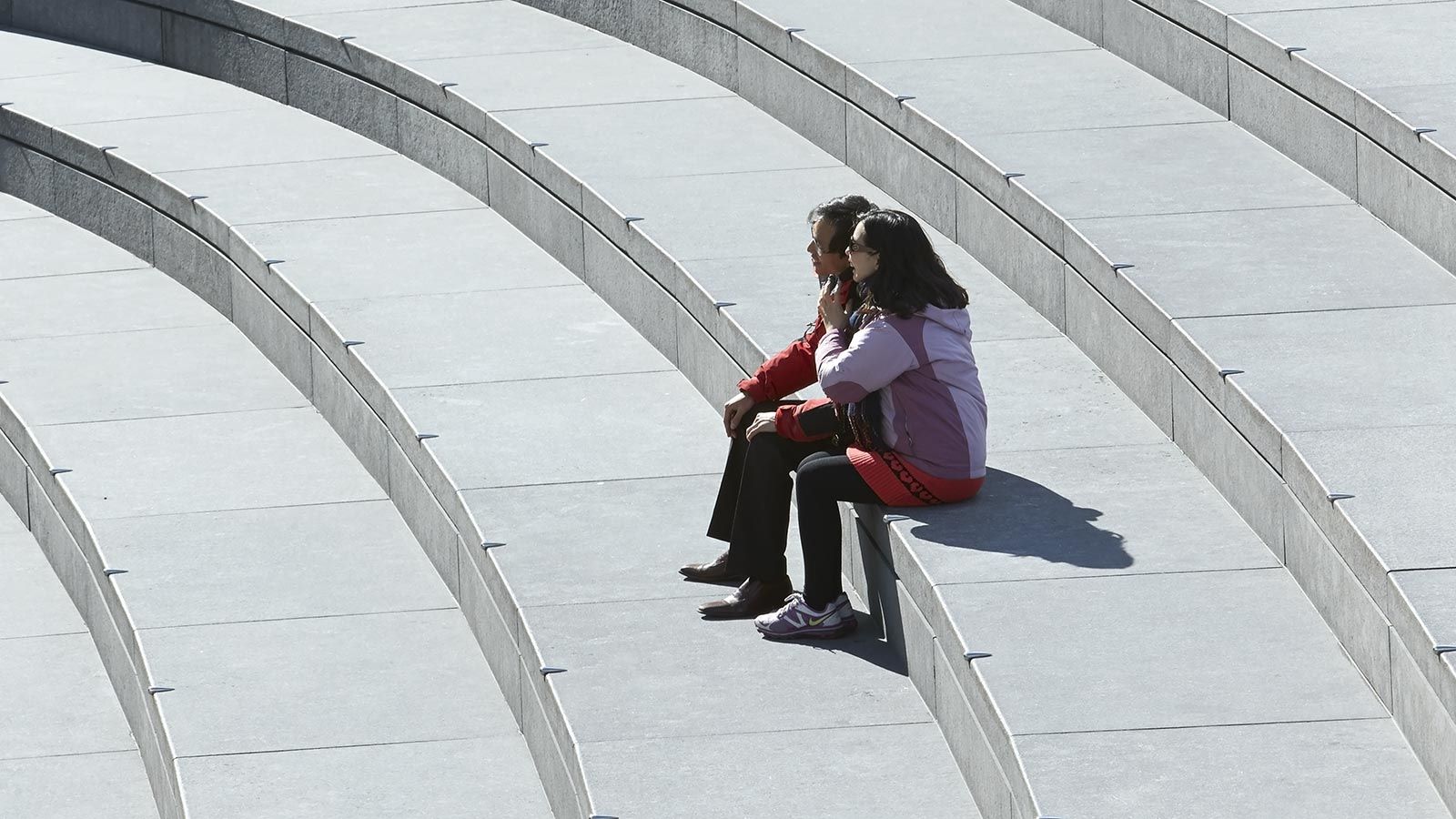 People Sitting on London City Hall Steps - Mace Group